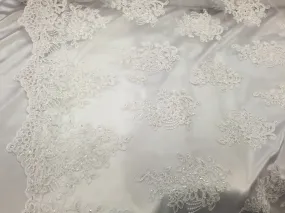 White flower lace corded and embroider with sequins on a mesh. Wedding/bridal/prom/nightgown fabric. Sold by the yard.